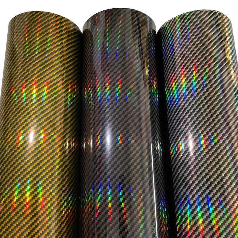 three rolls of black and rainbow colored carbon fiber