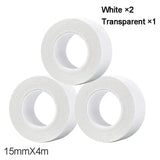 three rolls of white tape are stacked on top of each other