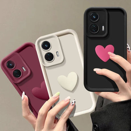 Three silicone phone cases with heart designs.