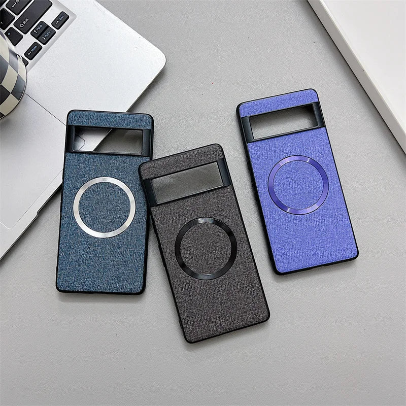 Three smartphone cases with circular cutouts in different colors (teal, gray, and purple).