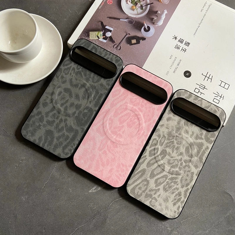 Three smartphone cases with a leopard print pattern, a circular magnetic charging ring, and a rectangular camera module cutout.