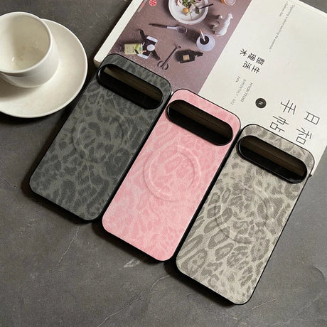 Three smartphone cases with a leopard print pattern, a circular magnetic charging ring, and a rectangular camera module cutout.