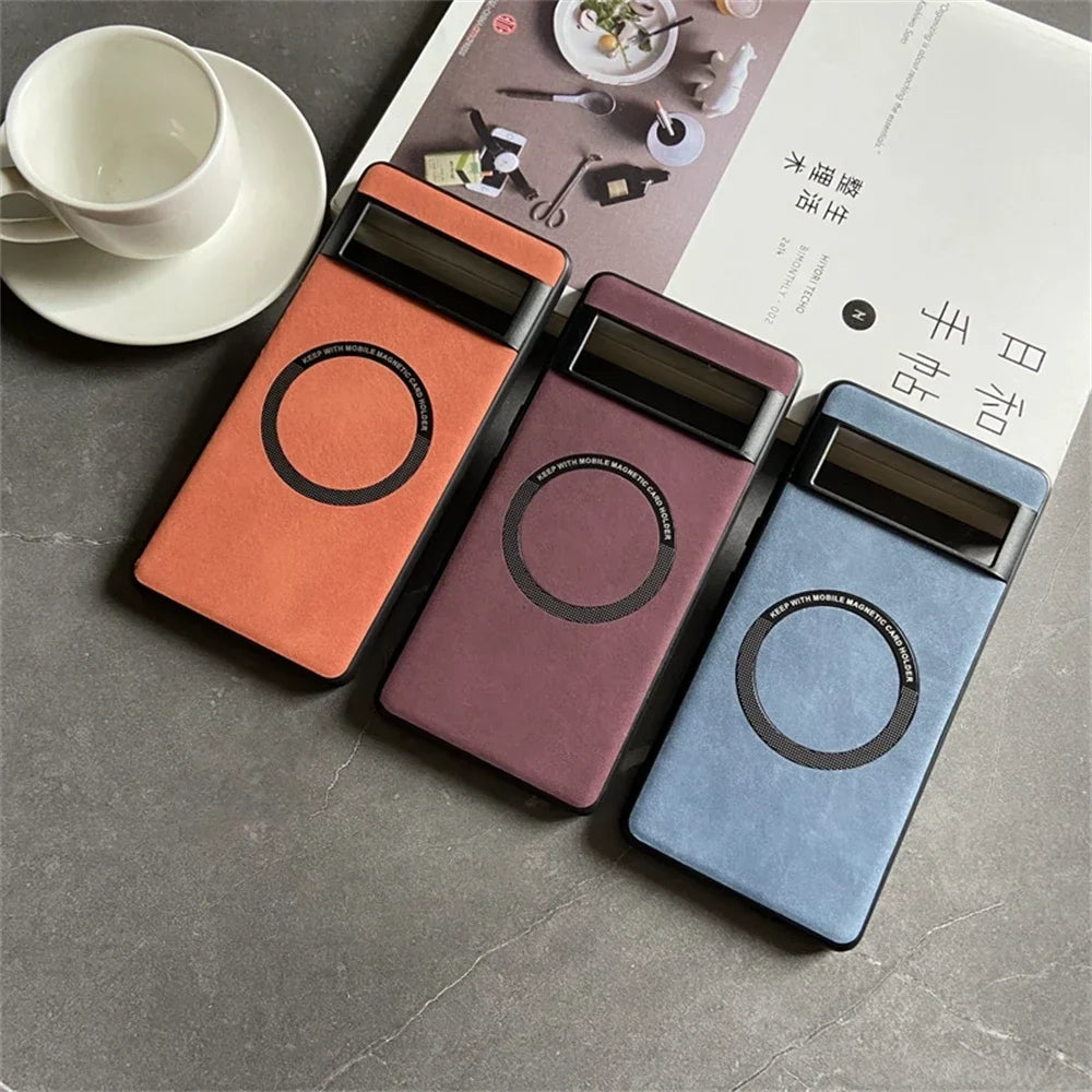 Three smartphone cases in orange, purple, and blue colors with circular cutouts.