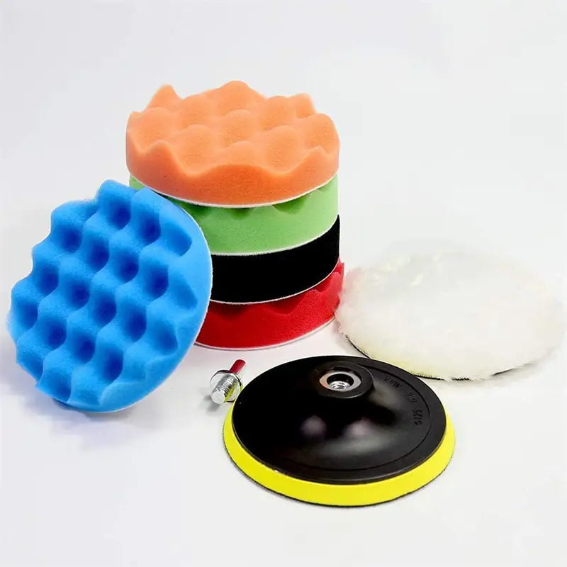a set of three different colored sponges