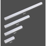three white fluorescent tubes with measurements for each tube