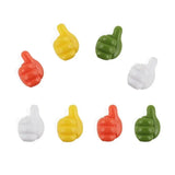 a set of six plastic thumbs