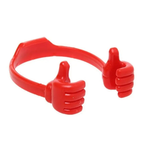 a red plastic ring with two thumbs