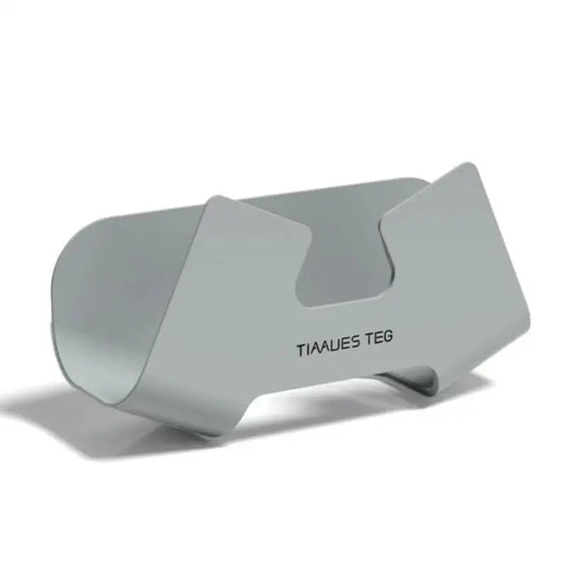 the tates stand is a grey plastic stand with a metal base