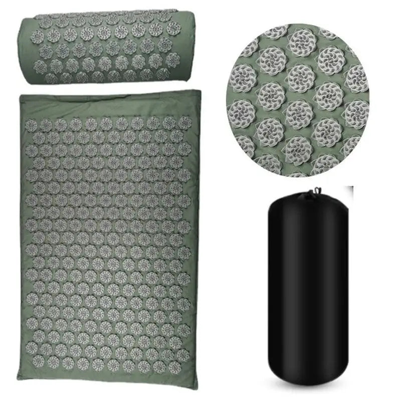 a green and white bed set with a black pillow, pillow and pillow cover