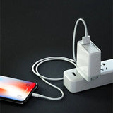 an iphone charging station with a charging cable