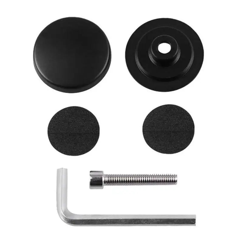 a black knob and screw with a screw