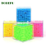 three different color mazes in a clear box