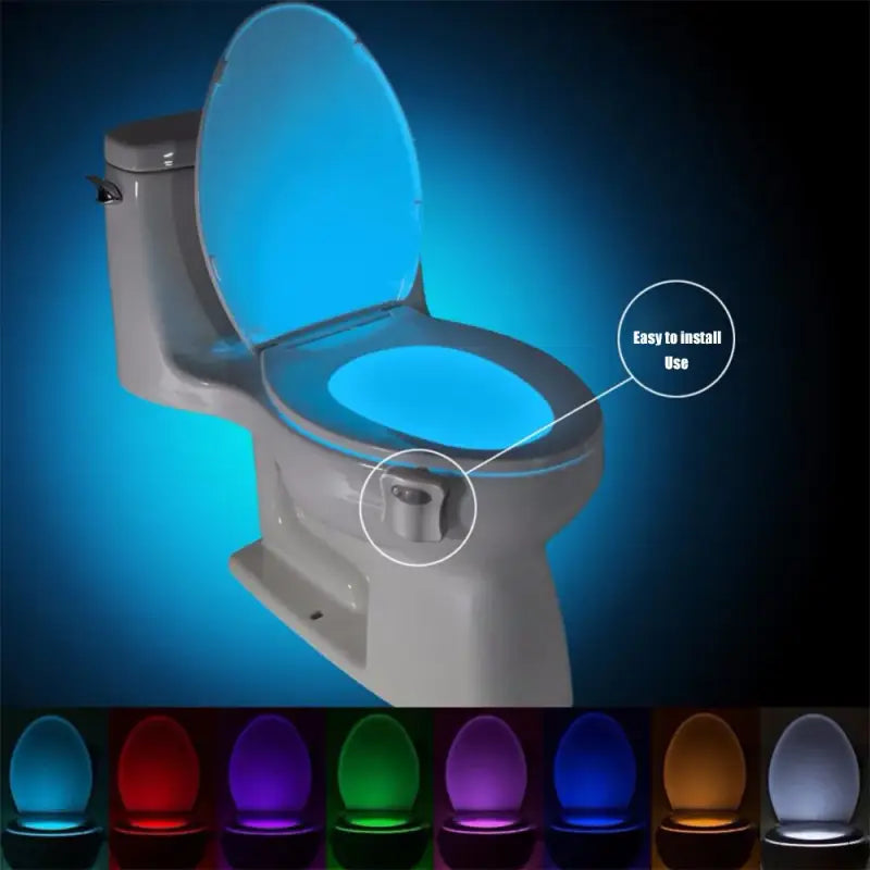 A toilet with a blue light on the lid