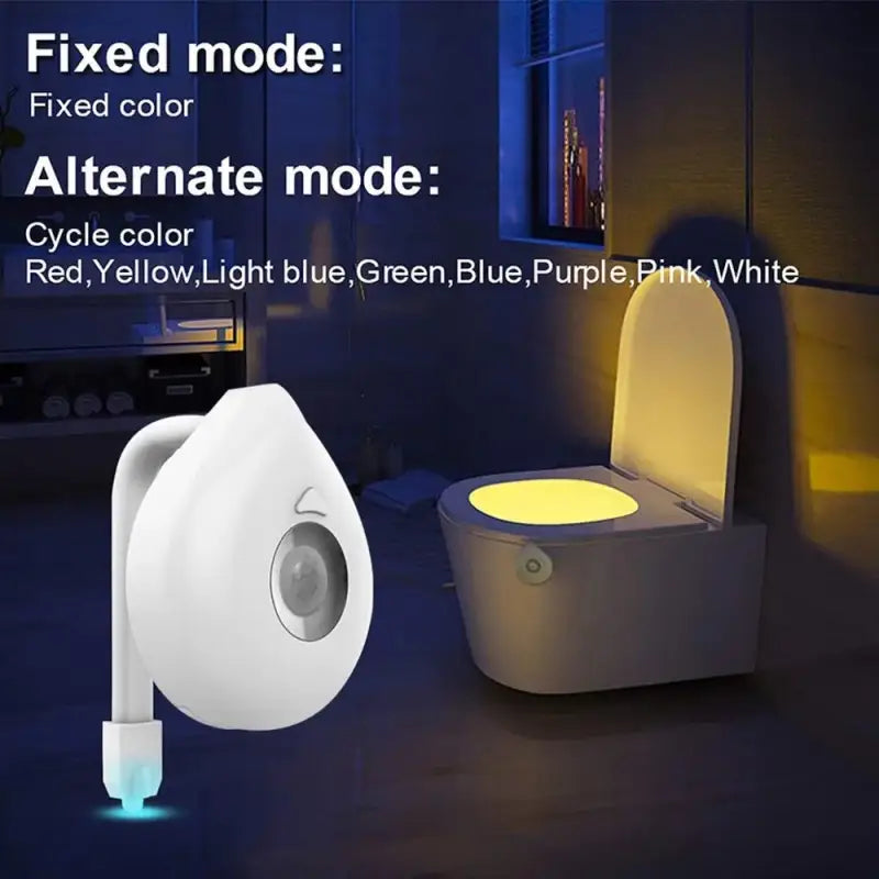 a toilet with a light on it and a toilet bowl