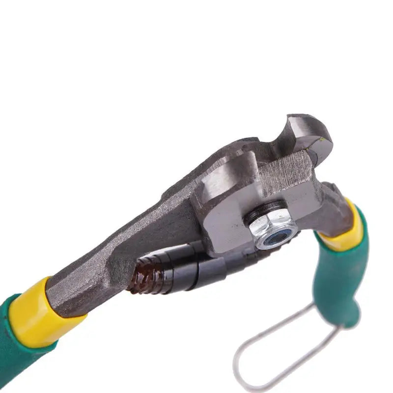 a close up of a pliers with a green handle and yellow handles