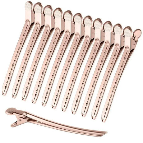 a set of rose gold hair combs with a hair brush