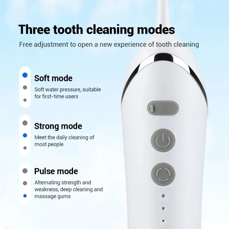 the toothbrush is a white toothbrush with a blue sky background