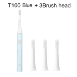 the toothbrush is a white toothbrush with three different colors