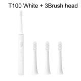 the toothbrush is a white toothbrush with three different sizes