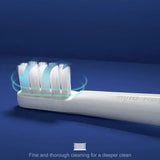 a toothbrush with a toothbrush on it