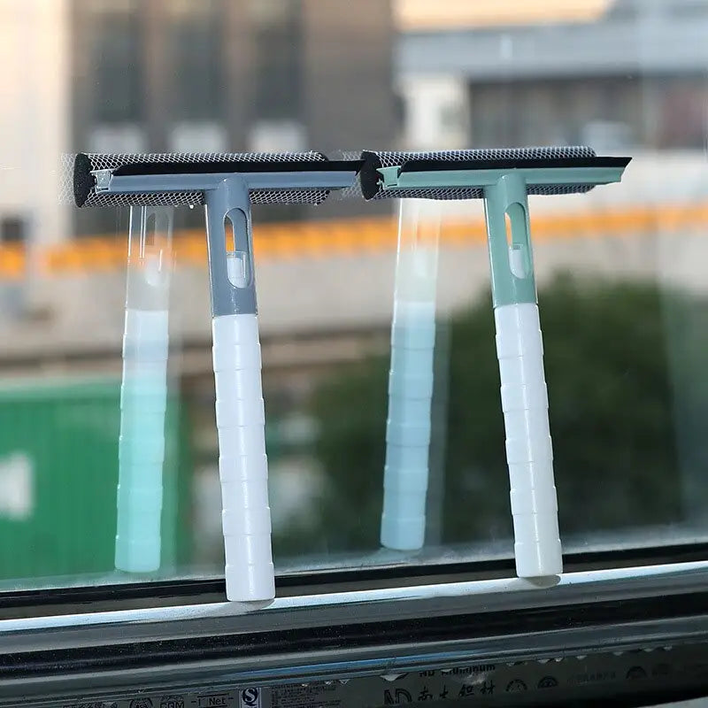 two plastic tooth brushes sitting on a window sie