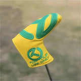 a golf glove with a yellow and green logo