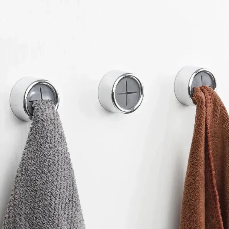 a towel rack with two towels hanging on it