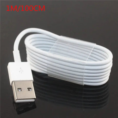 a close up of a white usb cable connected to a white charger