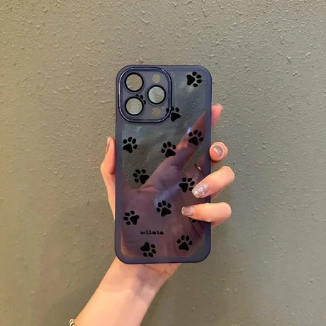 Back side of a translucent purple samsung galaxy phone case with black paw print decals and subtle brand logo