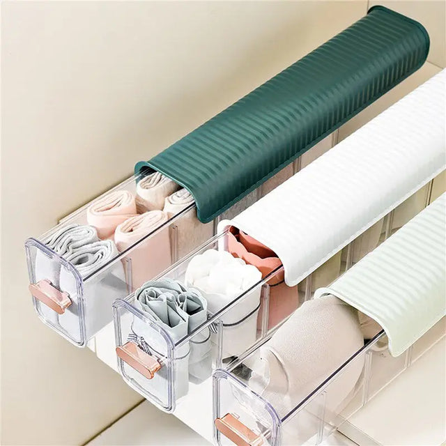 a bathroom shelf with two rolls of toilet paper