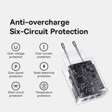 Transparent electrical adapter or charger with visible internal circuitry and two prongs.