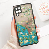Back side of a transparent samsung galaxy phone case with black border featuring vibrant almond blossom art design line art phone