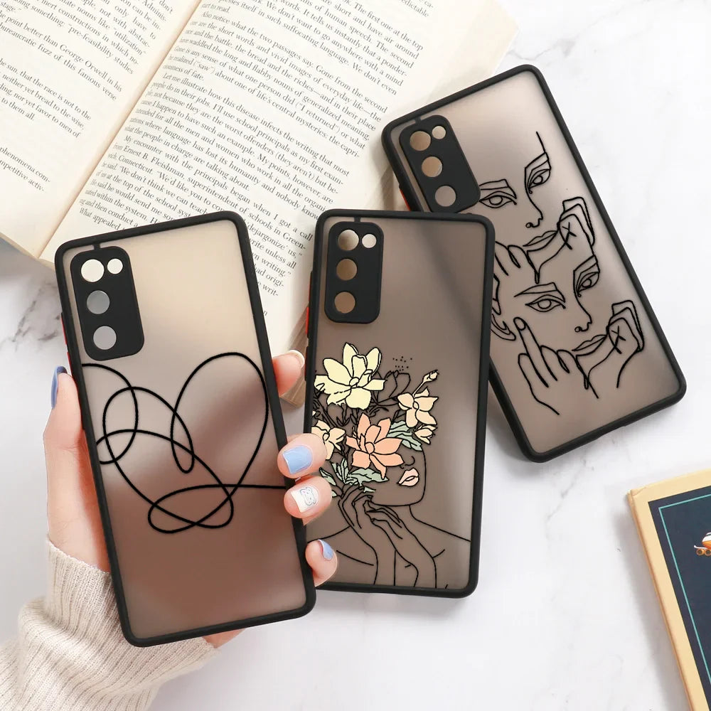 Transparent line art design phone case for Samsung Galaxy featuring black heart and floral patterns on the front