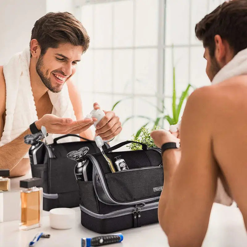 a man in a bath room with a black bag