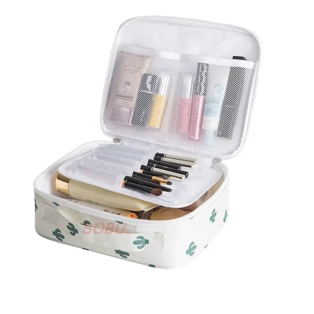 the travel makeup case is open and has a lot of makeup products inside