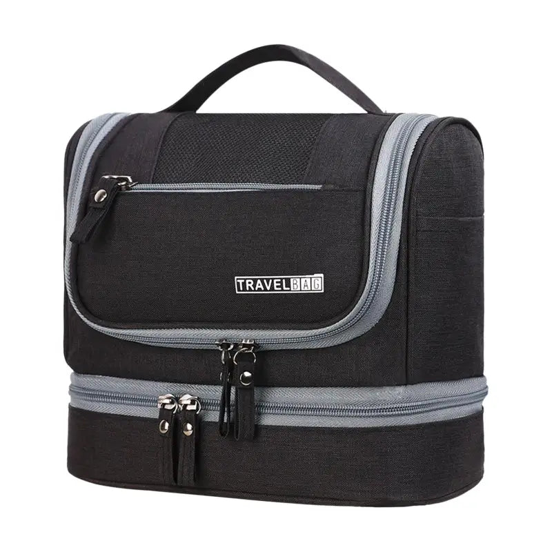 the travel bag is a large, black and grey bag with a zipper closure