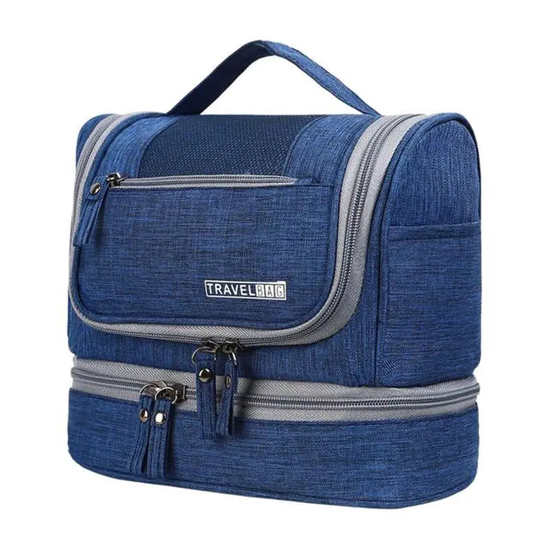 the travel bag is a large, blue, and grey bag with a zipper closure