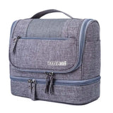 the travel bag is a large, grey bag with a zipper closure