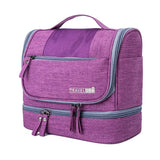 the travel bag is purple with a zipper closure