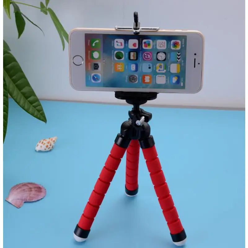 a cell phone holder on a tripod