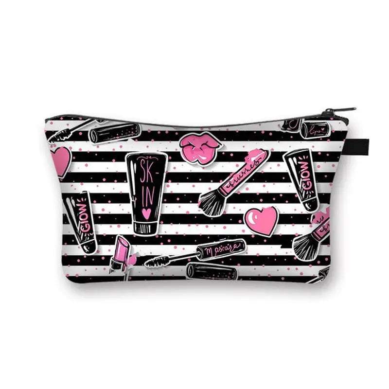 a black and white striped makeup bag with pink and white stripes