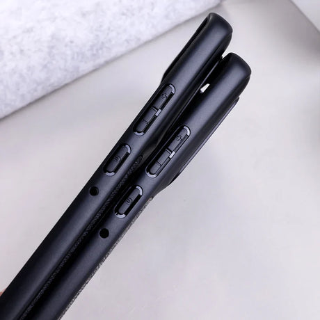 Two black mobile phone cases with visible side buttons.