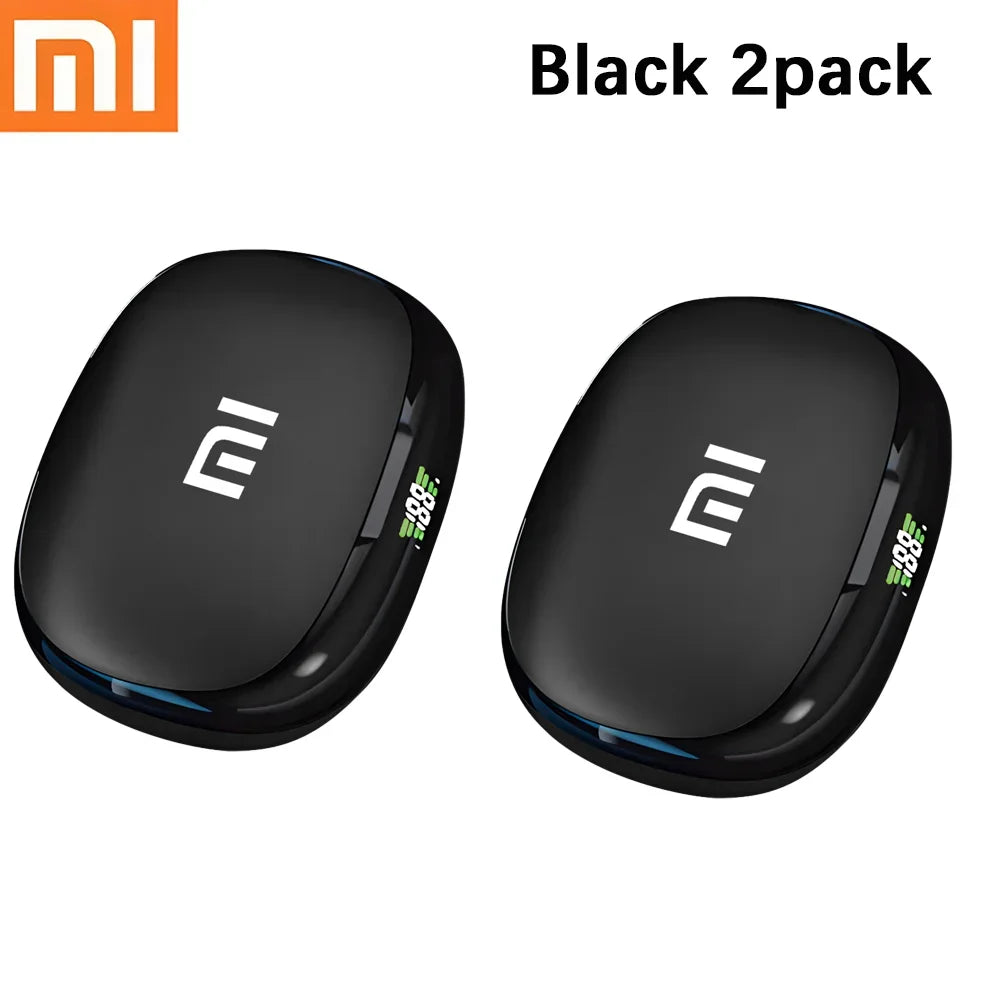 Two black, oval-shaped Xiaomi wireless earbuds with the Mi logo visible on each.