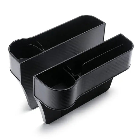 two black plastic storage containers with a white background