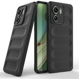 Two black, rugged phone cases with textured back panels, one featuring a visible phone screen.