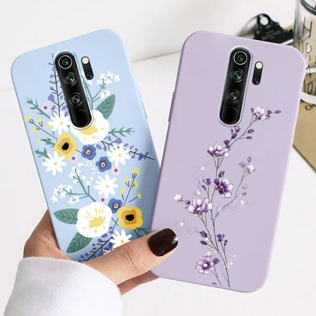 Two cases with flowers on them