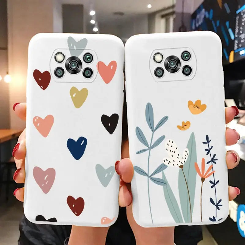 two cases with hearts and flowers