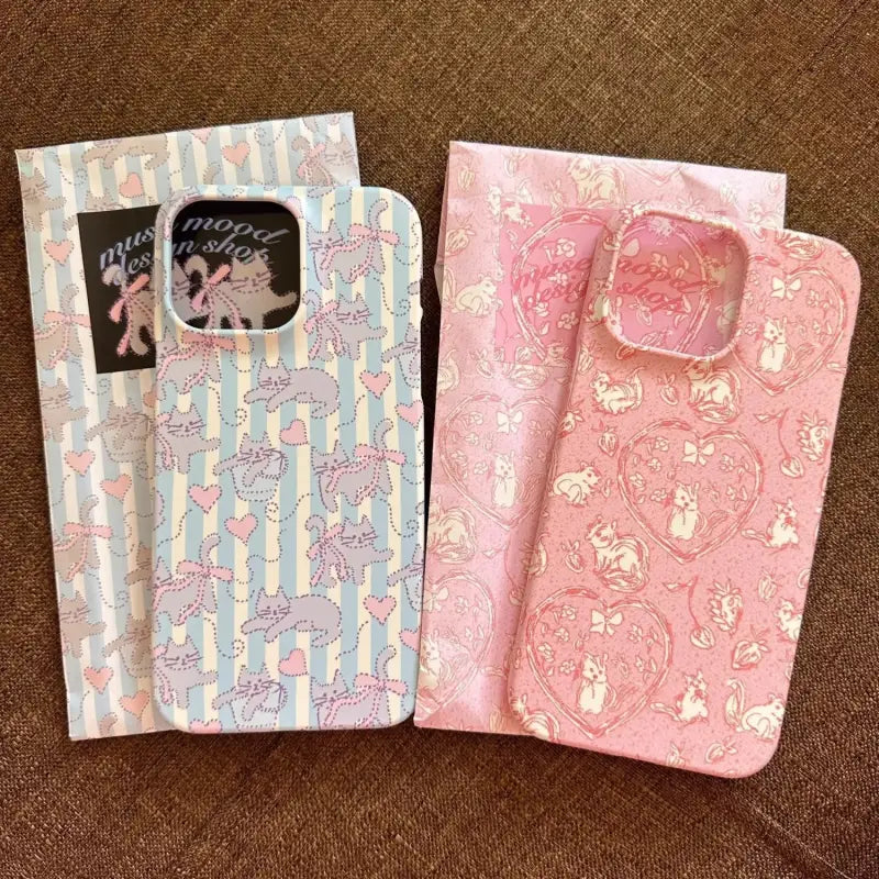 two cases with a pink and blue pattern