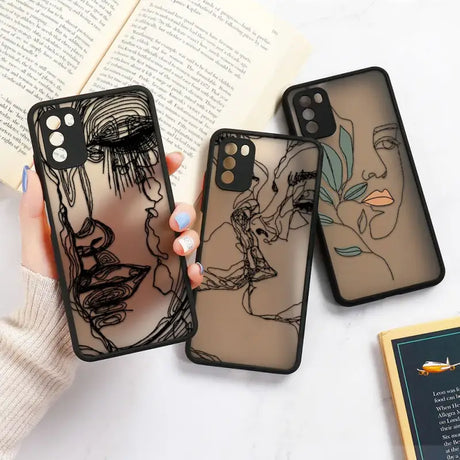 Two cases with a drawing of a woman and a man on them