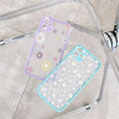 Two clear cases with flowers on them